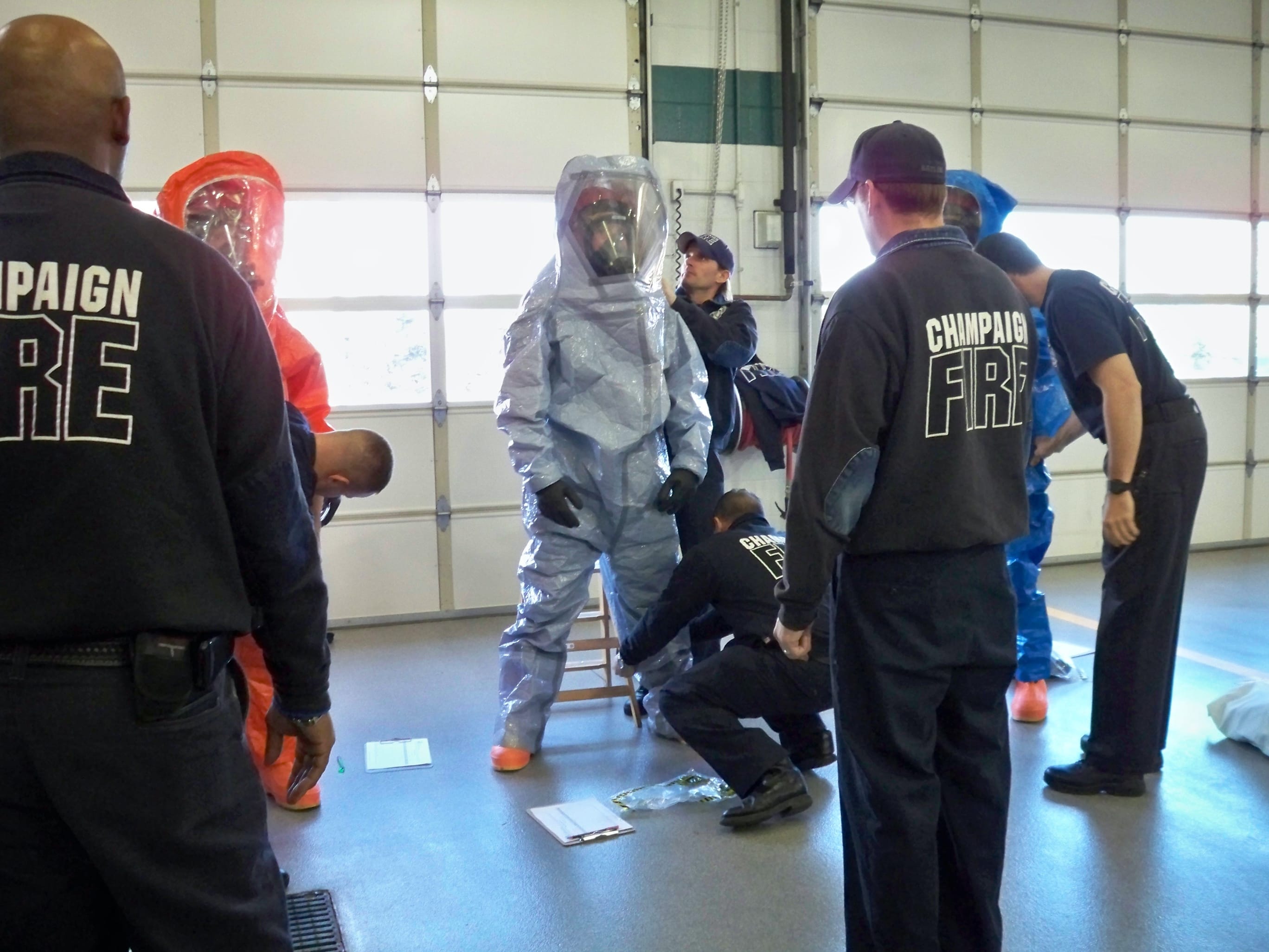 Firefighters demonstrating hazmat PPE.