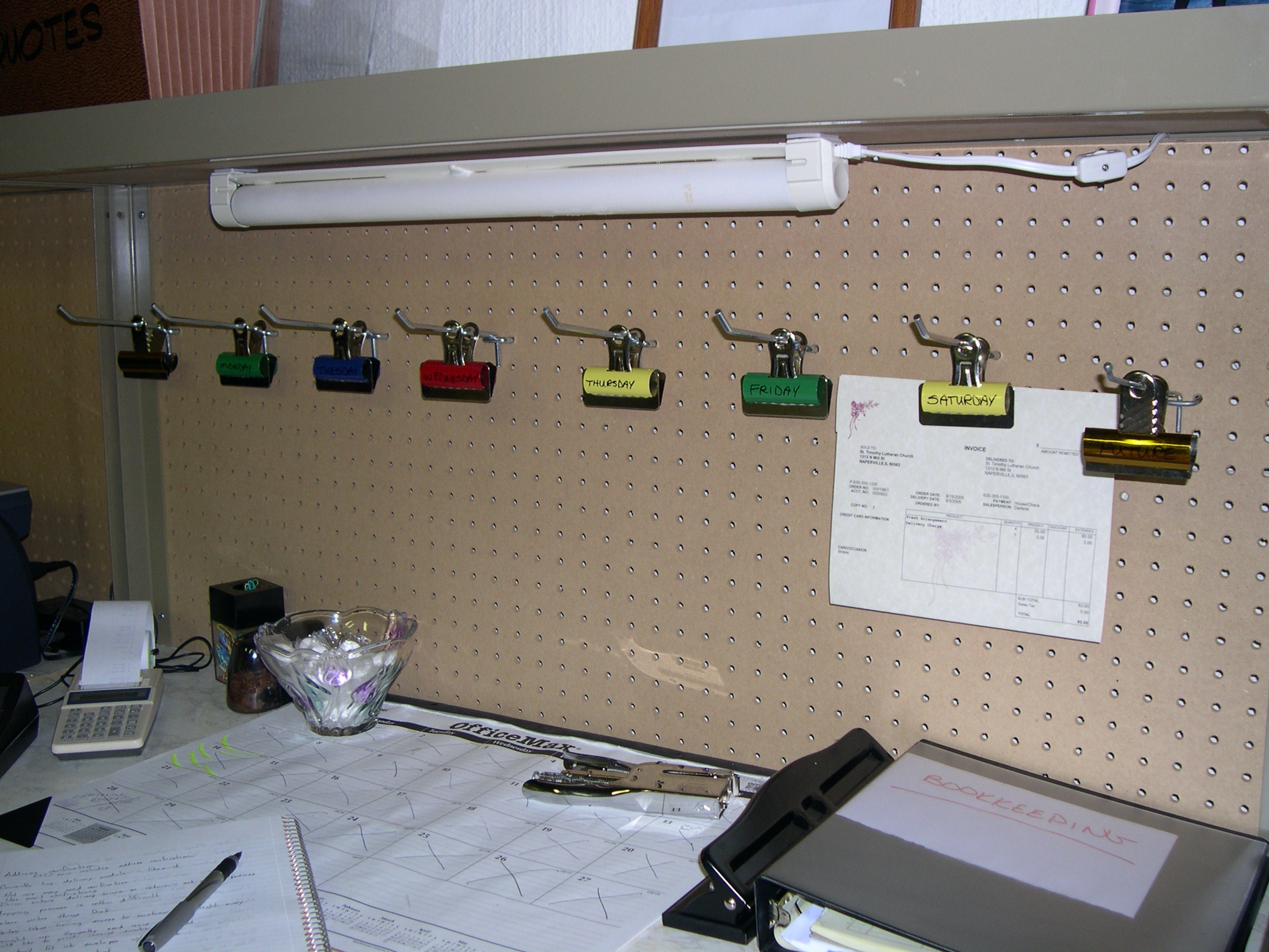 Photo of a makeshift calendar at a florist shop.